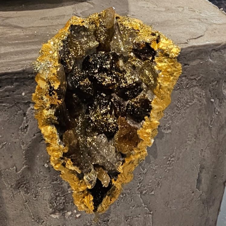 Gold crystal geode detail on a celebration cake