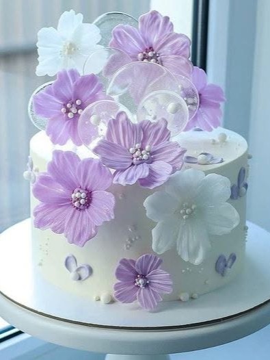 Personalised wedding cake with handcrafted decorative details
